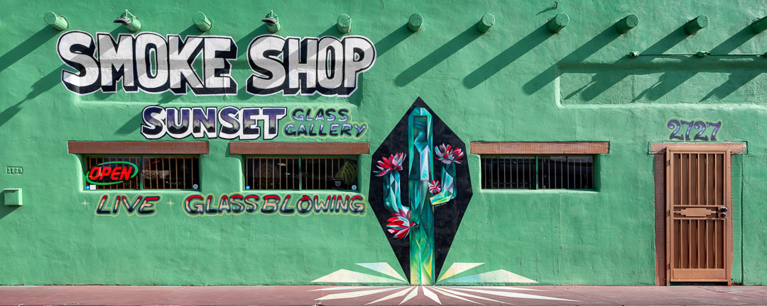 Urbanwalls 10. 250901 AZ _6_28 Painted side of Smoke Shop Sunset Glass Gallery with crystal-like saguaro. Tuscon.